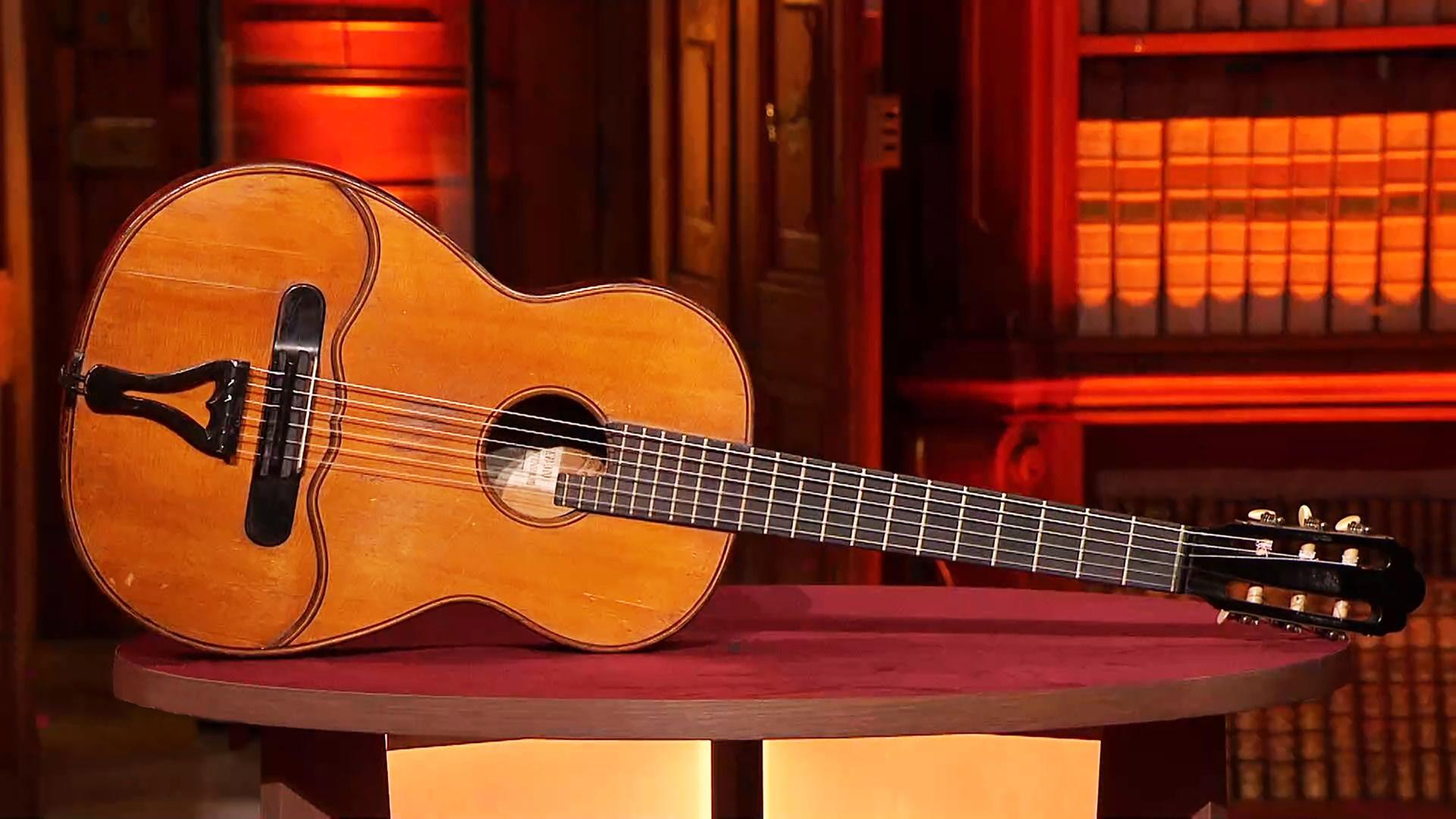 Eine akustische Gitarre.