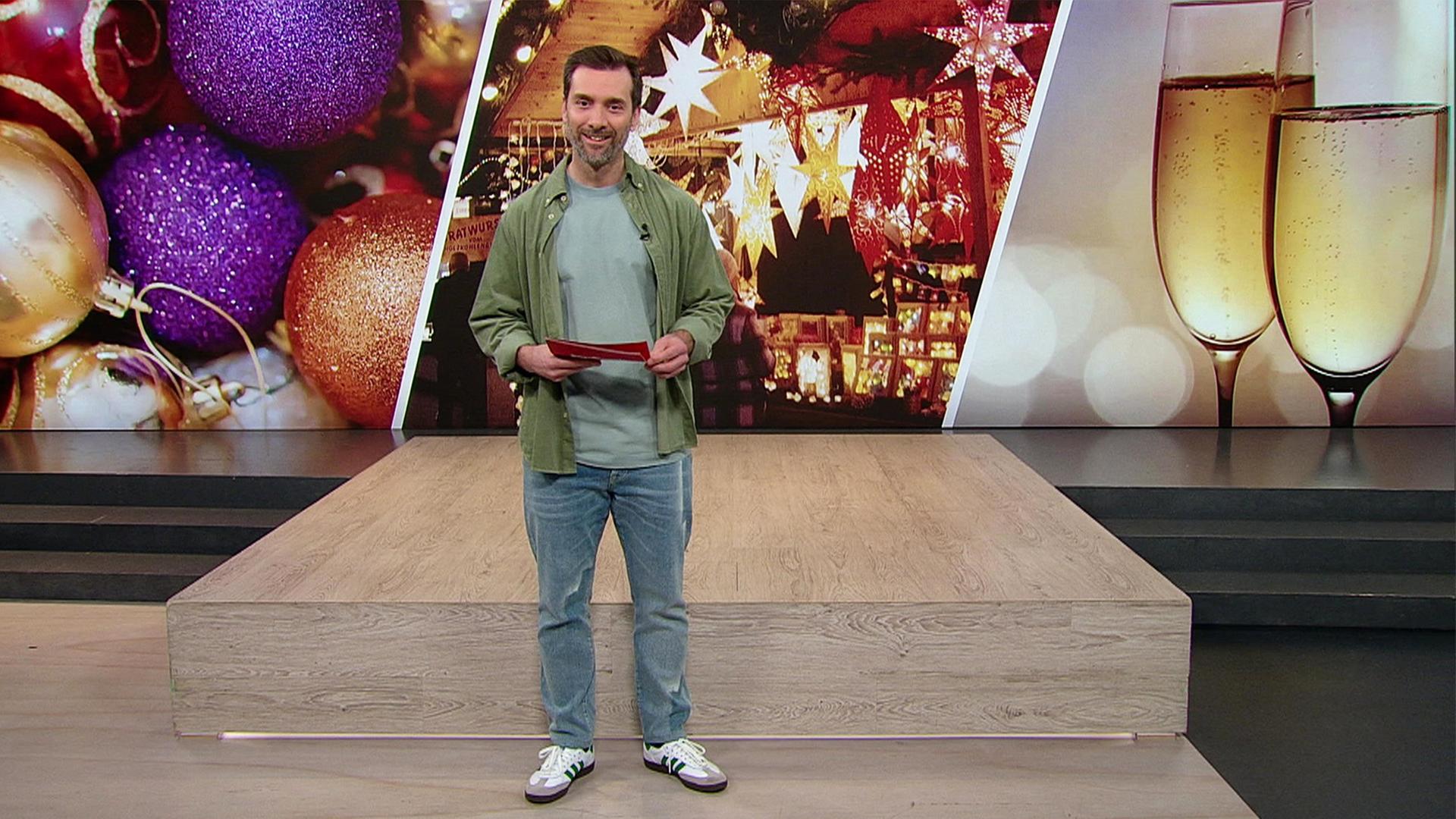 Moderator Daniel Aßmann.