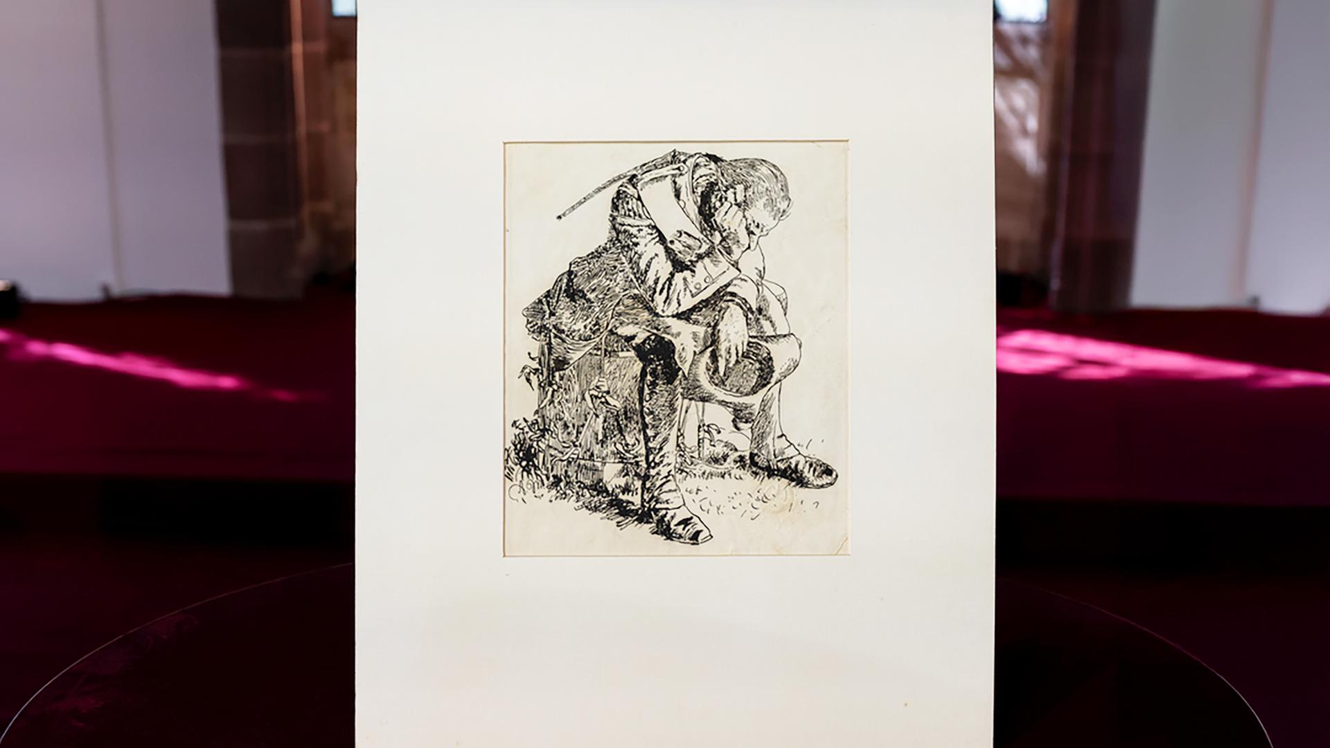 Eine Zeichnung eines sitzenden Soldaten mit hängendem Kopf.