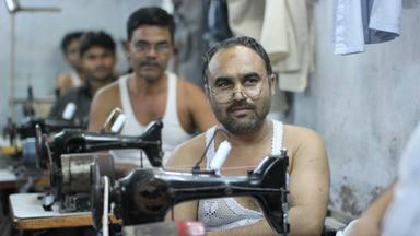 Näher in einer Textilfabrik in Indien