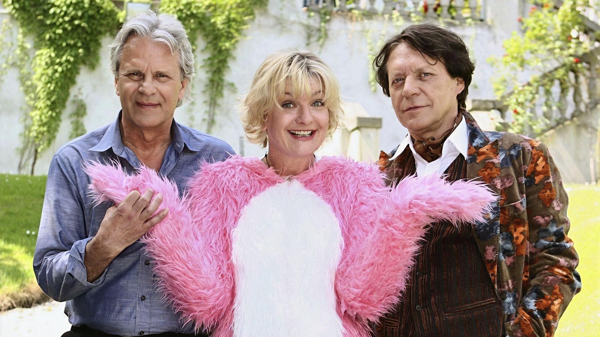 Eine Frau und zwei Männer.