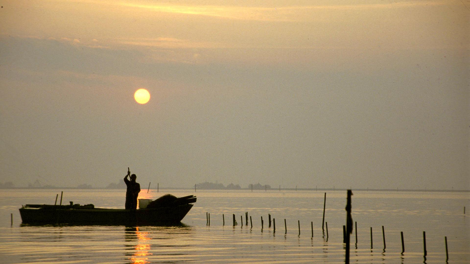 Fischer in der Laguna di Marano