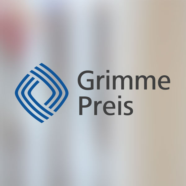 der Schriftzug "Grimme Preis" auf einem verschwommenen Hintergrund