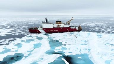 Ein Schiff zwischen Eisschollen.