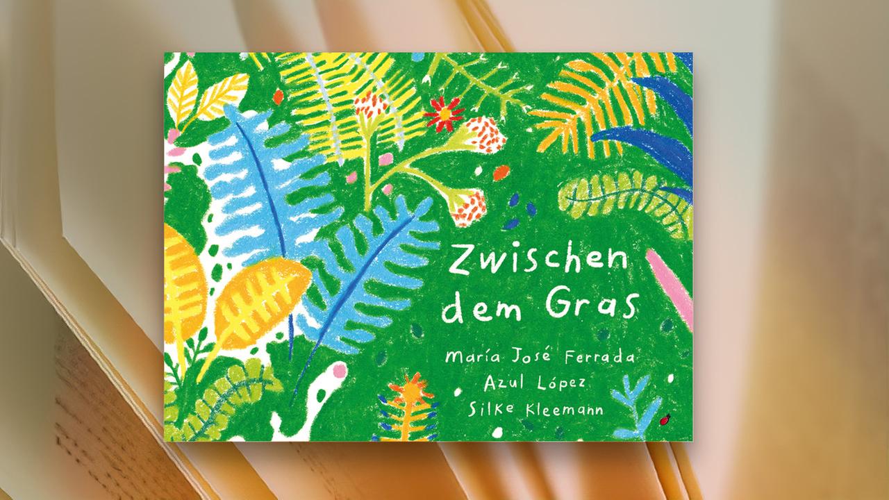 Auf dem Umschlag des Kinderbuchs ist das gemalte Bild von einer grünen Wiese mit Blumen und Blättern zu sehen.