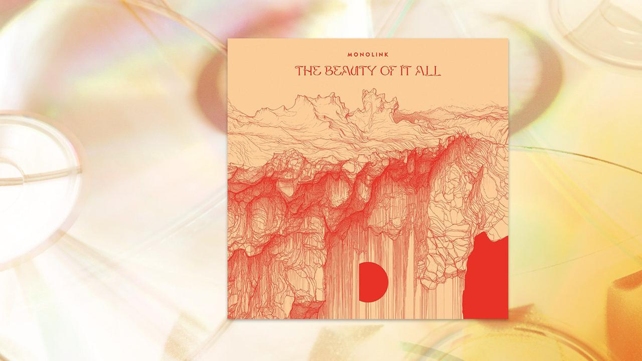 Auf dem Albumcover steht The Beauty Of It All über einer Zeichnung aus vielen roten Linien, die an Wolken, oder ein Gebirge erinnern.