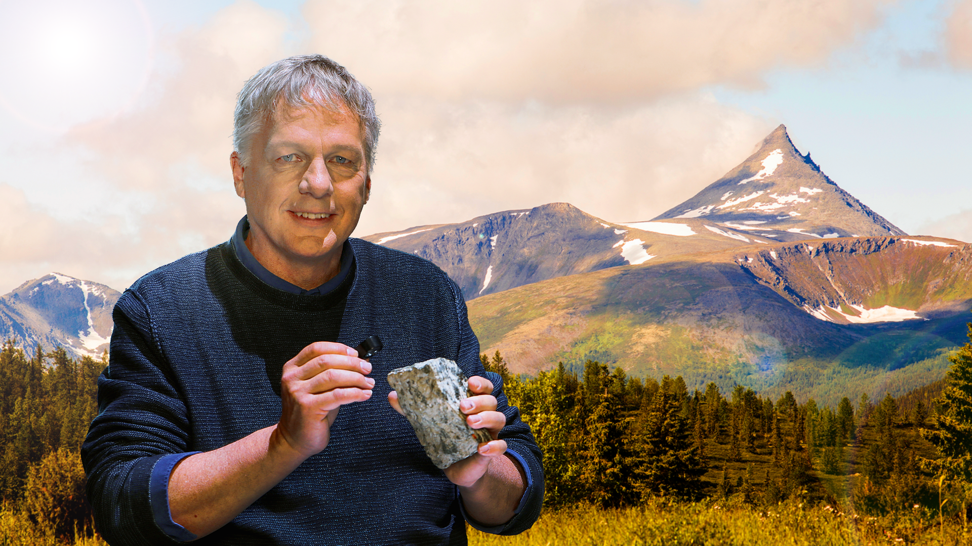 Colin Devey, im Hintergrund Wals und Gebirge