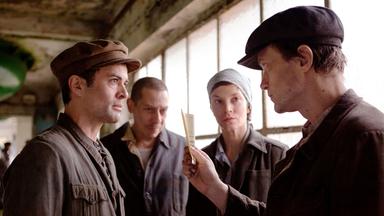 Eine Gruppe Arbeitnehmer*innen.