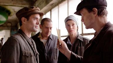 Eine Gruppe Arbeitnehmer*innen.