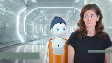 Katty Salié mit einem Roboter