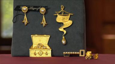 hochwertiger Modeschmuck von Karl Lagerfeld bestehtend aus Ohrringen und Broschen