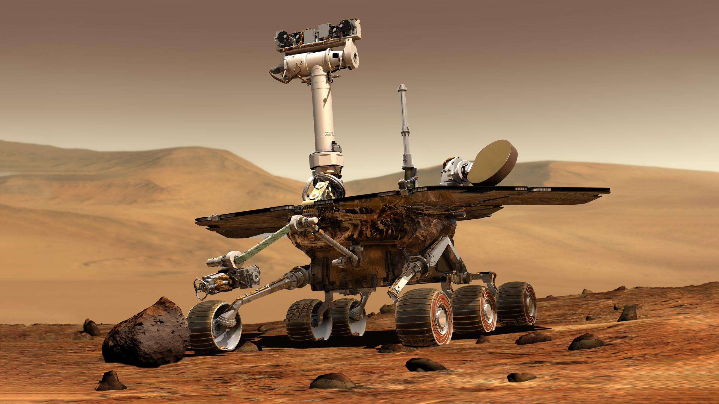 Ein Robotor auf dem Mars untersucht Gesteine und andere Vorkommnisse auf dem roten Planeten