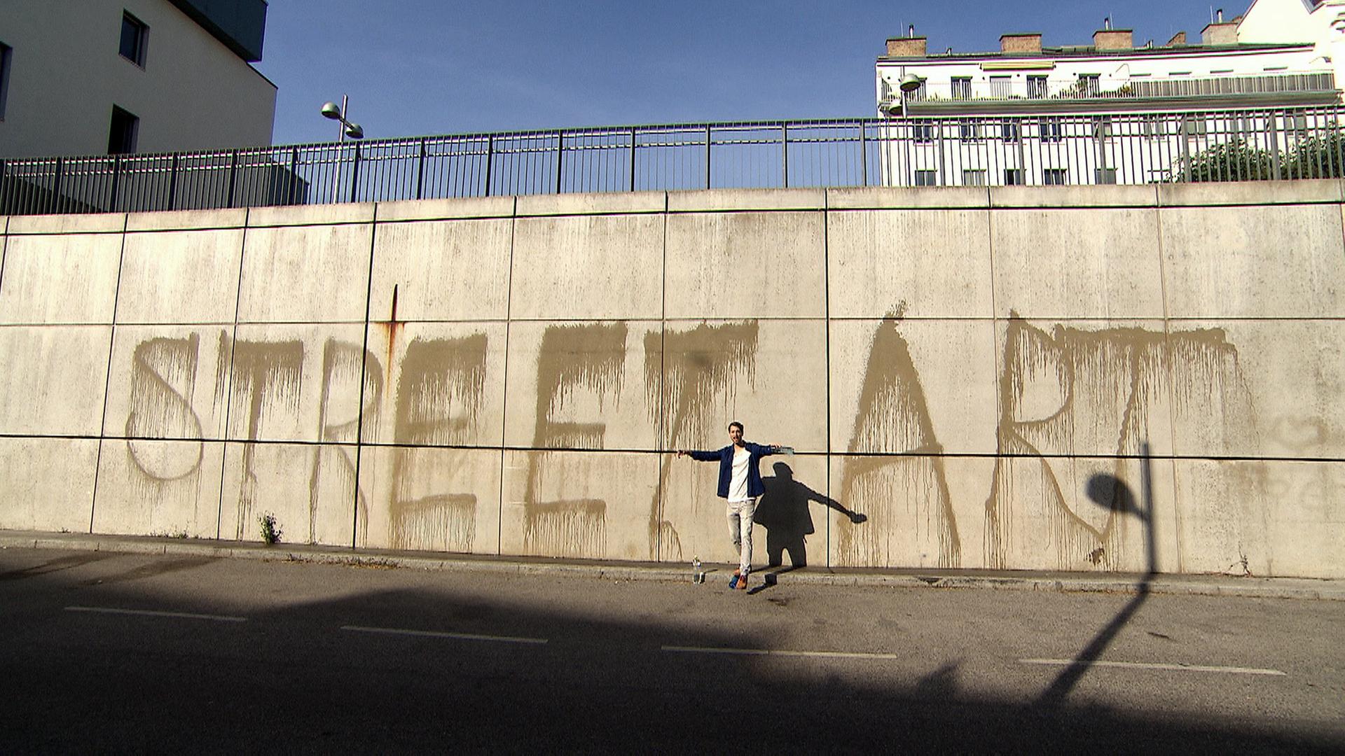 "Manuel Murel" sprayt mit Wasser auf Wänden - und schafft so Street-Art-Werke für wenige Minuten.