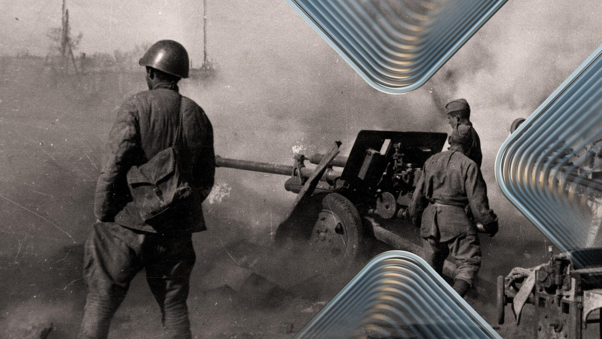 Soldaten vor Artilleriegeschütz