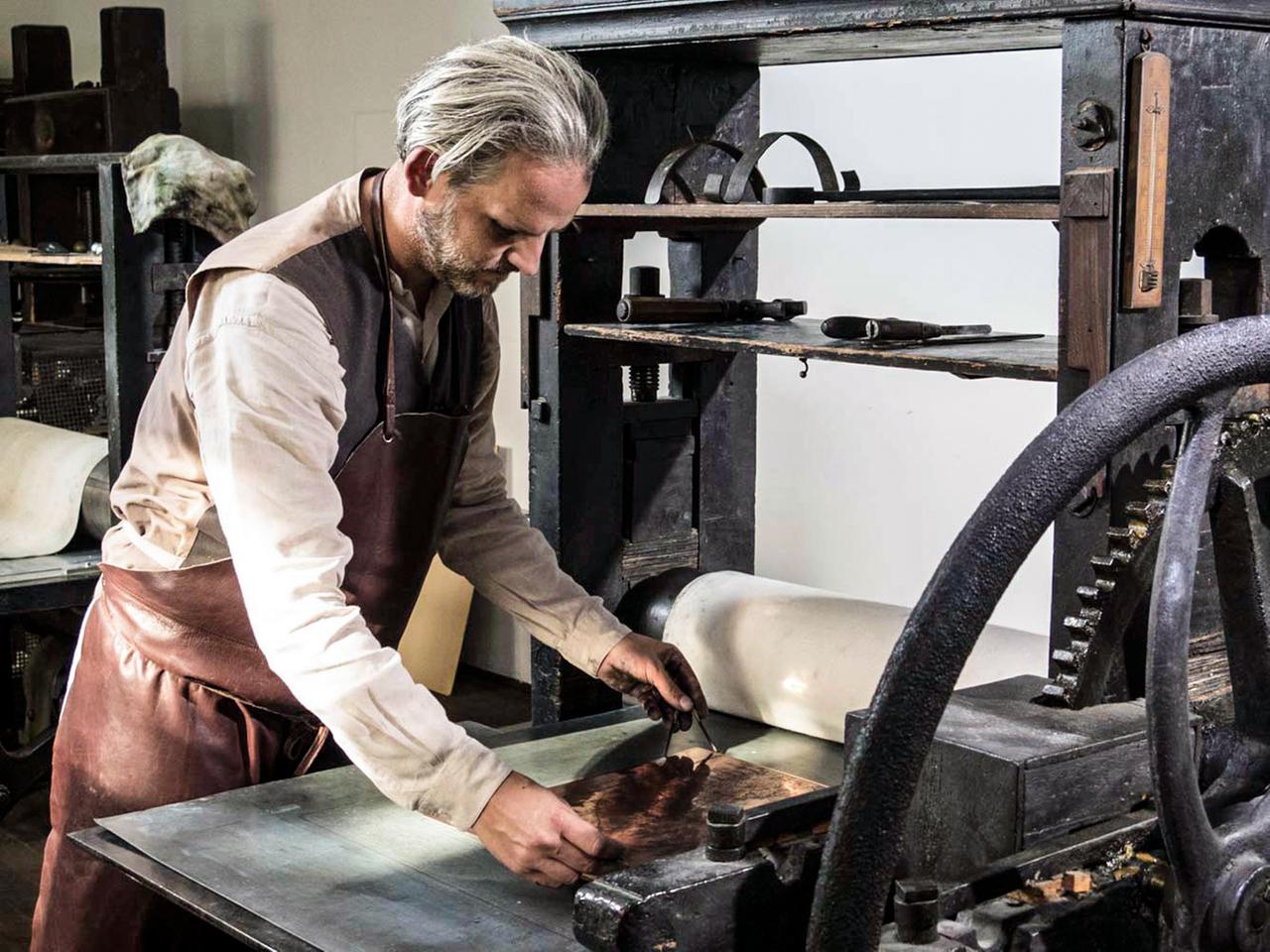 Drucker in historischer Darstellung
