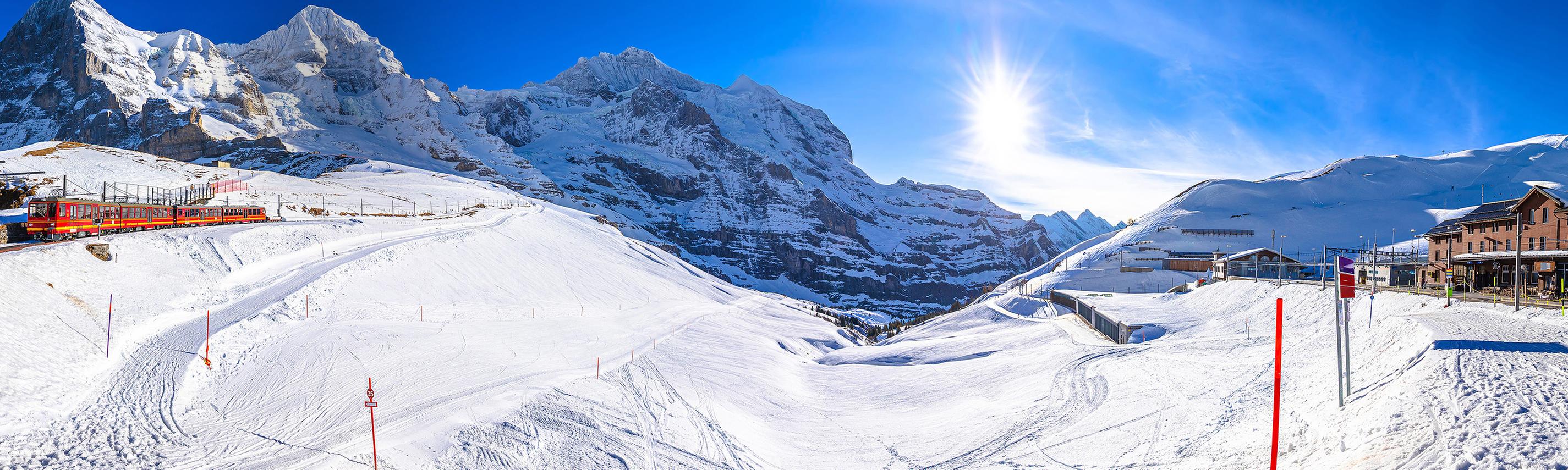 Winterwunderland Schweiz per Bahn Hintergrund